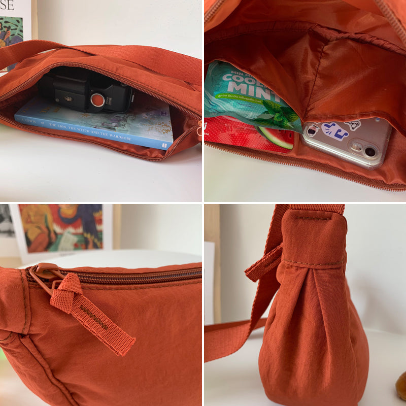 "Damer halvmåne crossbody-väska av slitstarkt nylon i gul färg med justerbar axelrem, stilren och praktisk."