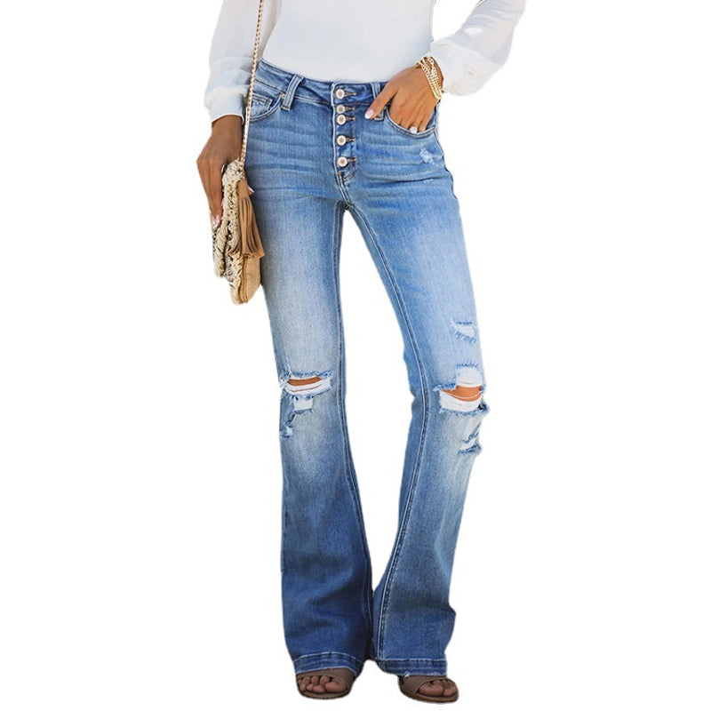 "Damer höga midja mörkblå slitna jeans med femknappar, visar subtila slitdetaljer för en modern och stilren look."