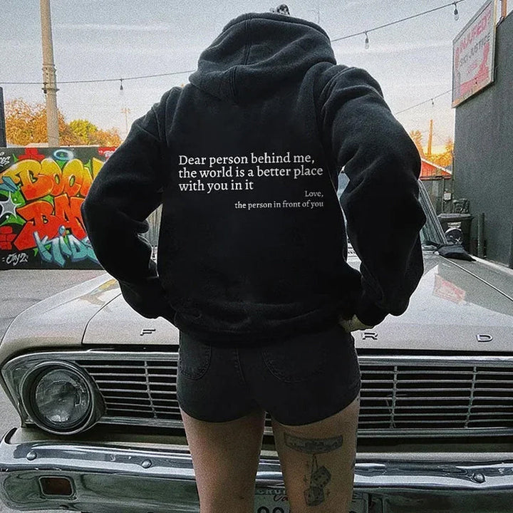 "Damer huvtröja med tryck 'Dear Person Behind Me', aprikos, grå och svart, långärmad, avslappnad och bekväm passform."