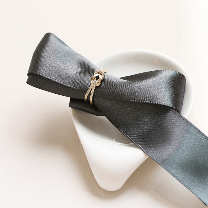 "Damer justerbar vänskaps knut ring i guld, gyllen rosa och silver. Tidlös design med elegant knutmotiv."