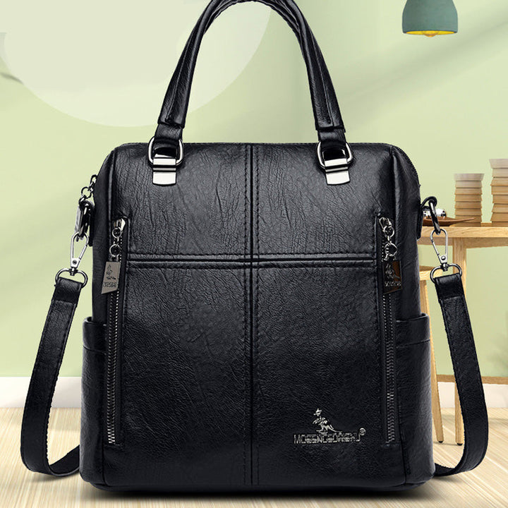 "Damer PU-läder multifunktionell ryggsäck i röd, elegant och slitstark design för vardag och resor, stor kapacitet."