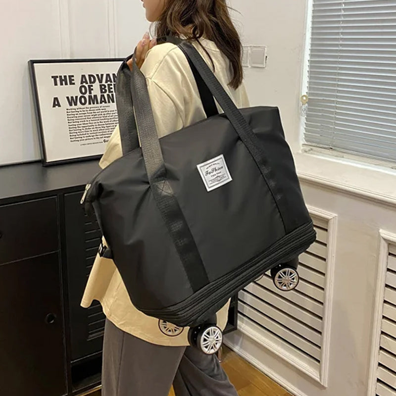 "Damer resväska i Oxford-tyg med stor kapacitet, elegant design och fyrhjulsdesign för enkel rörlighet."