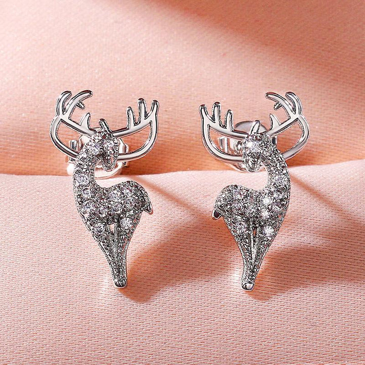 Damer silver älgformade örhängen, glansiga och eleganta tillbehör, fångar ljus och blickar. Perfekta för alla tillfällen.