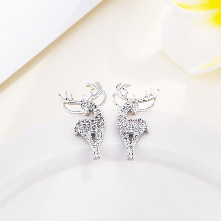 Damer silver älgformade örhängen, glansiga och eleganta tillbehör, fångar ljus och blickar. Perfekta för alla tillfällen.
