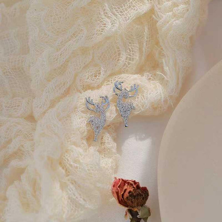 Damer silver älgformade örhängen, glansiga och eleganta tillbehör, fångar ljus och blickar. Perfekta för alla tillfällen.