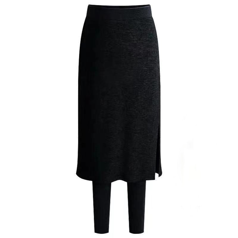 "Damer termiska vinterleggings med fleecekjol i svart, mjukt och varmt material, idealiska för kalla dagar med elegant stil."
