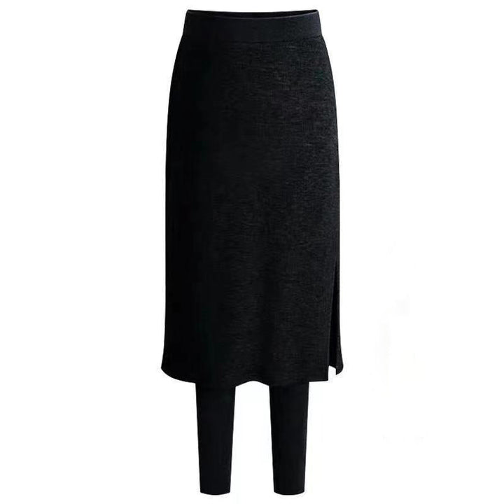 "Damer termiska vinterleggings med fleecekjol i svart, mjukt och varmt material, idealiska för kalla dagar med elegant stil."