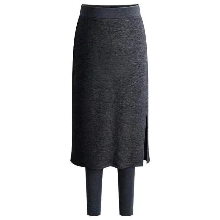 "Damer termiska vinterleggings med fleecekjol i svart, mjukt och varmt material, idealiska för kalla dagar med elegant stil."
