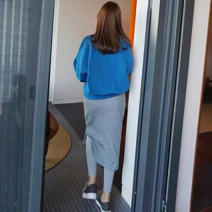 "Damer termiska vinterleggings med fleecekjol i svart, mjukt och varmt material, idealiska för kalla dagar med elegant stil."