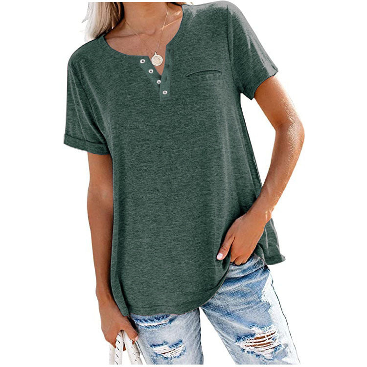 "Damer V-ringad T-shirt i bomull med fickdetalj, elegant design, visar fickan och V-ringningen, finns i flera färger."