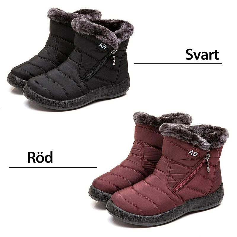 "Damer Vattentäta Snöskor i svart med värmande fluff, tålig gummisula och elegant design för vintern."