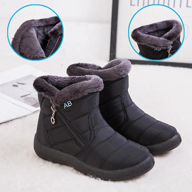"Damer Vattentäta Snöskor i svart med värmande fluff, tålig gummisula och elegant design för vintern."