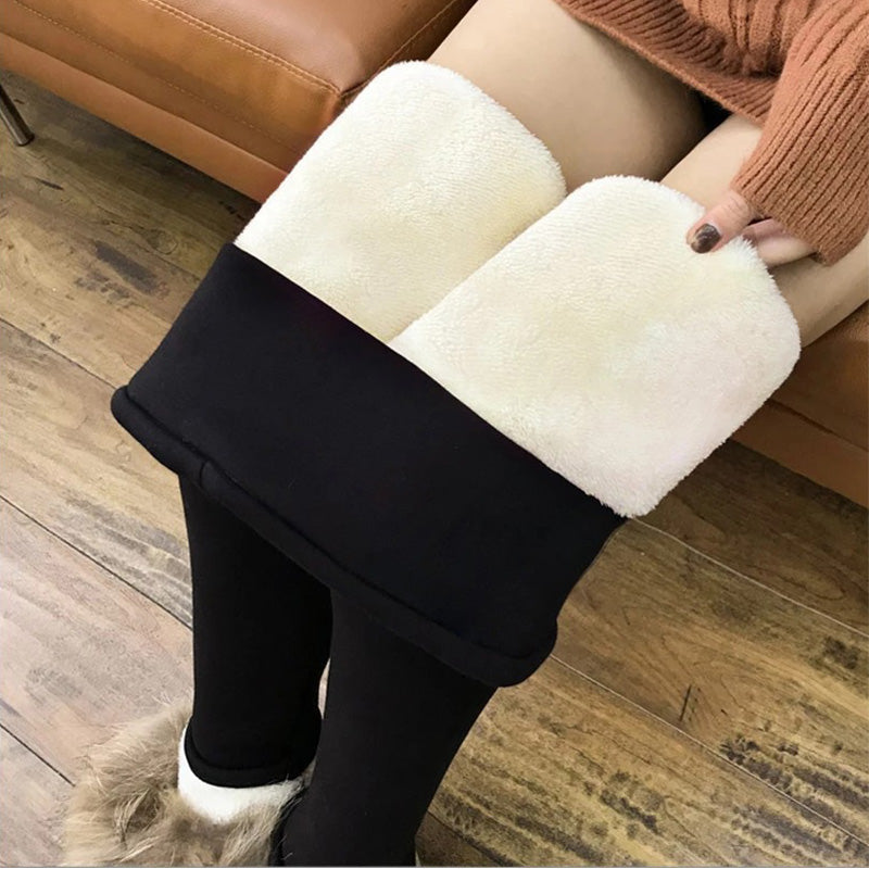 "Damer vinter leggings med plysch foder i svart, hög midja, varm och bekväm design för kallt väder, flexibelt material."