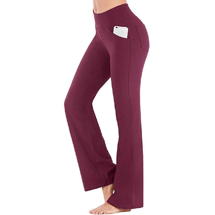 "Damer yogabyxor med hög midja och utsvängda ben i mjukt nylonmaterial, elegant design med fyra fickor och smickrande passfor