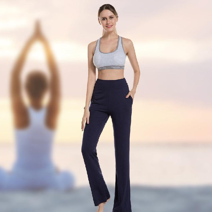 "Damer yogabyxor med hög midja och utsvängda ben i mjukt nylonmaterial, elegant design med fyra fickor och smickrande passfor