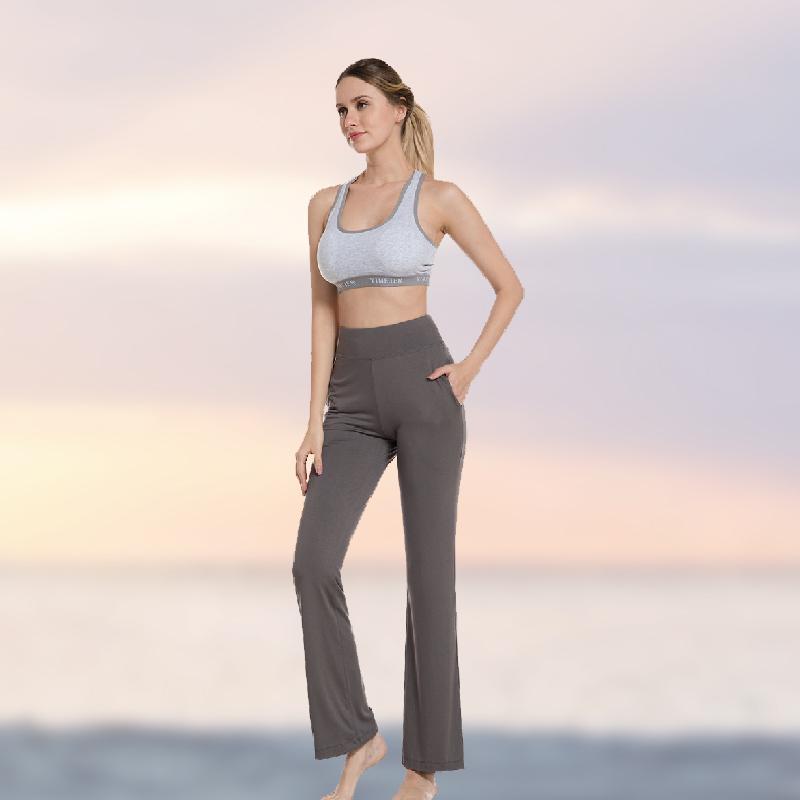 "Damer yogabyxor med hög midja och utsvängda ben i mjukt nylonmaterial, elegant design med fyra fickor och smickrande passfor