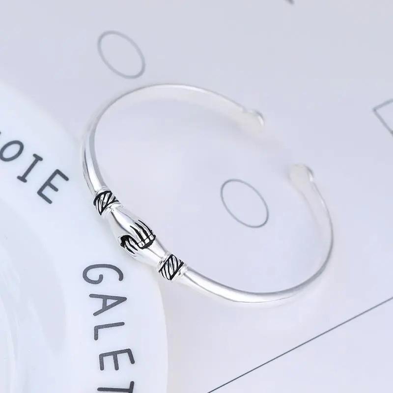 Damers S925 silverarmband med justerbar slinga och elegant design, perfekt för vänskap och alla tillfällen.