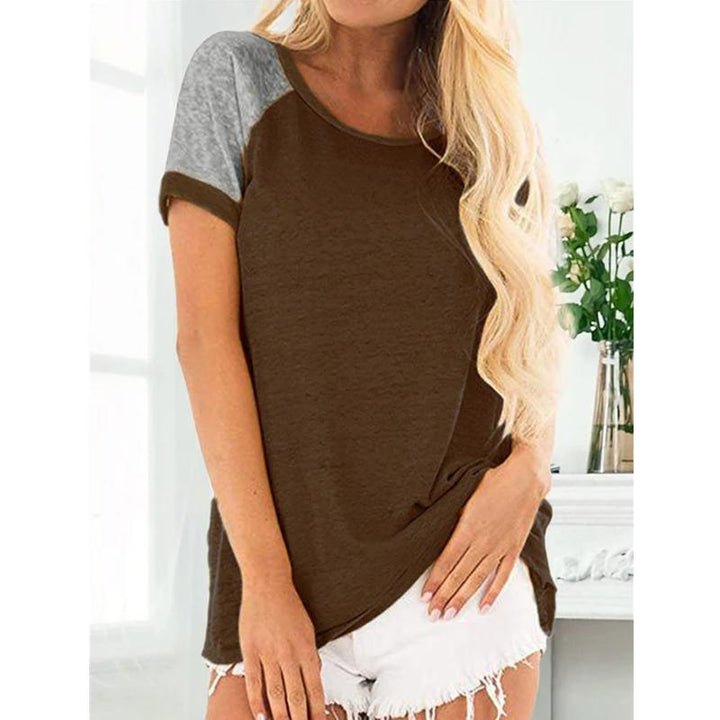 "Damhalsad T-shirt i kontrastfärg med rund hals och färgblockdesign, perfekt för lager på lager med jeans eller kjol."
