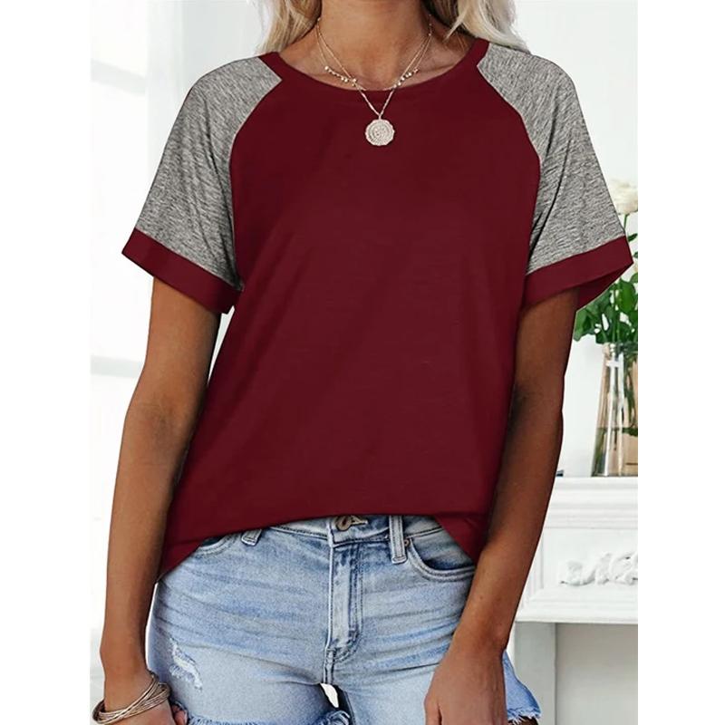 "Damhalsad T-shirt i kontrastfärg med rund hals och färgblockdesign, perfekt för lager på lager med jeans eller kjol."