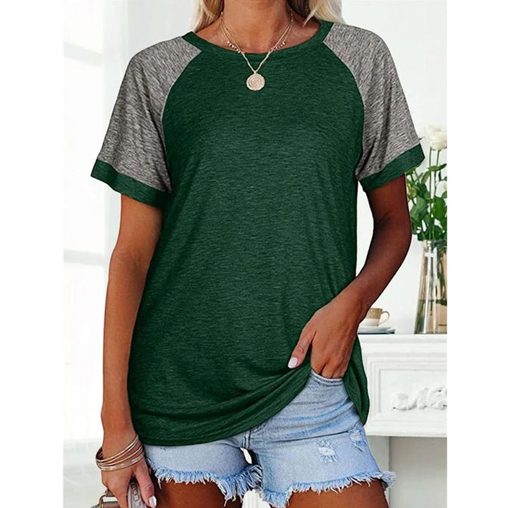 "Damhalsad T-shirt i kontrastfärg med rund hals och färgblockdesign, perfekt för lager på lager med jeans eller kjol."