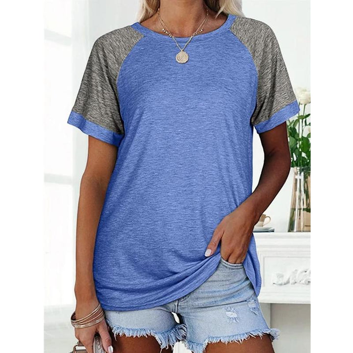 "Damhalsad T-shirt i kontrastfärg med rund hals och färgblockdesign, perfekt för lager på lager med jeans eller kjol."