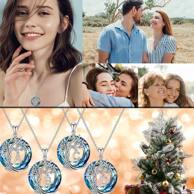 "Damhalsband i silver med livets träd och blå kristall, eleganta och symboliska smycken för unik kvinnlig stil."