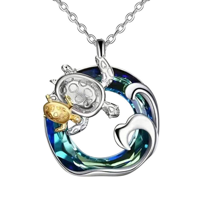 "Damhalsband med livets träd, kristallaccenter och smidig legering, symboliserar positiv energi och stil."