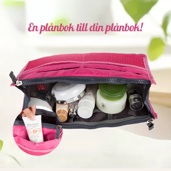"Damhandväska med flera fickor, kompakt design, i färger grön, lila, svart, vinröd, för stil och organisation."
