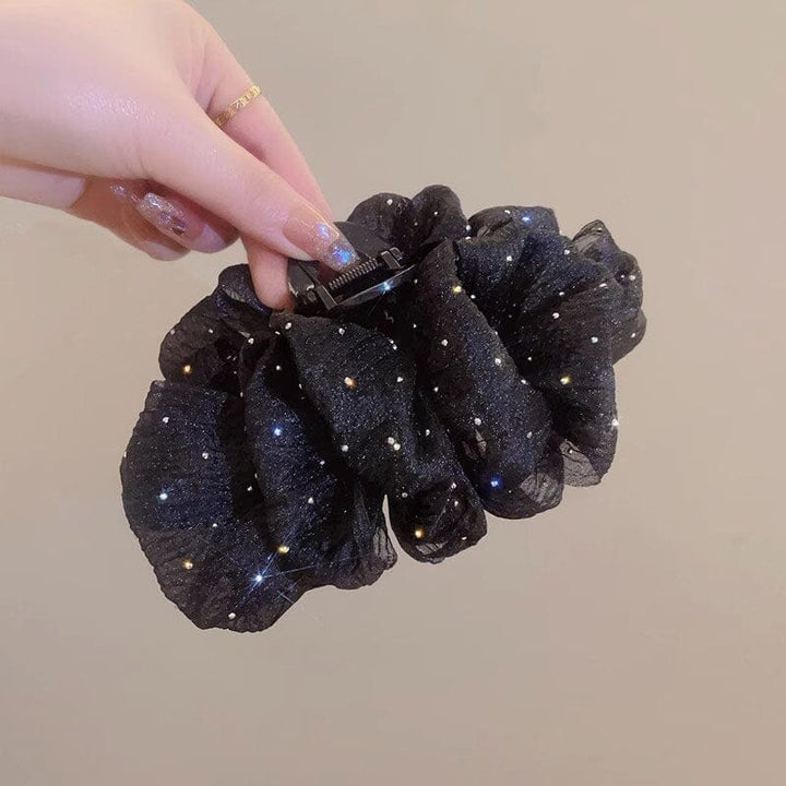 "Damhårsclips med bubbelrosett i lager av tyg, elegant handgjord design för stilrena och moderna frisyrer."