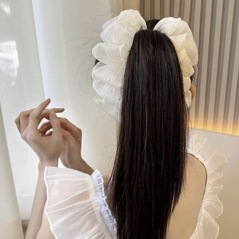 "Damhårsclips med bubbelrosett i lager av tyg, elegant handgjord design för stilrena och moderna frisyrer."
