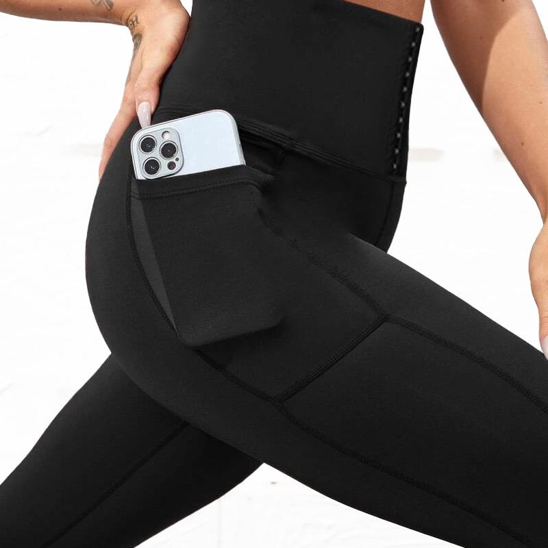 "Damhög midja leggings, elastisk passform, svart, formande, sidfickor, för träning och vardag. Perfekt för komfort."