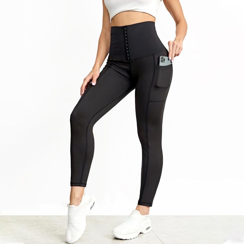 "Damhög midja leggings, elastisk passform, svart, formande, sidfickor, för träning och vardag. Perfekt för komfort."