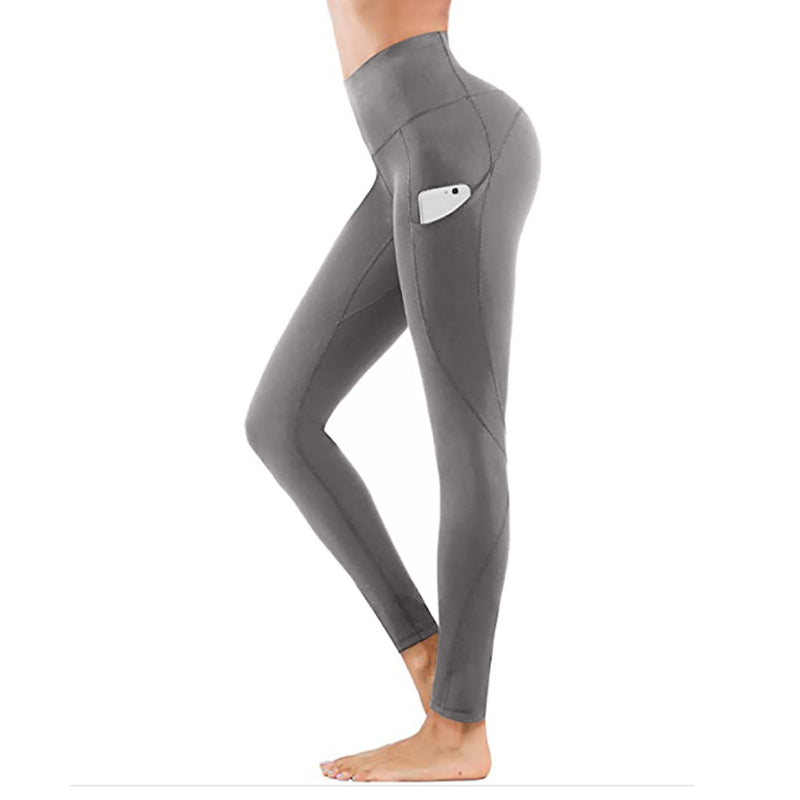 "Damhöga midjeleggings med fickor, rumplyft och kompression i svart, optimal för träning och stilfull vardagsanvändning."