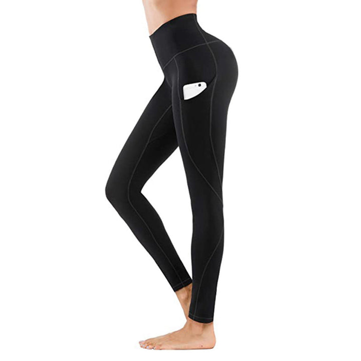 "Damhöga midjeleggings med fickor, rumplyft och kompression i svart, optimal för träning och stilfull vardagsanvändning."