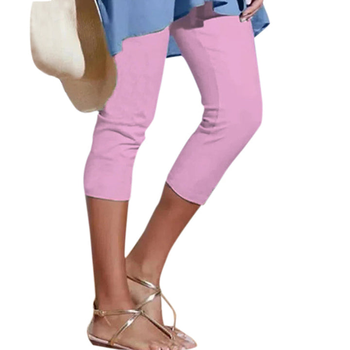 "Damhögmidja 3/4 yoga leggings med fickor, knälång, svart, smörmjuk yta, hög midja, främre fickor, stretchigt tyg."