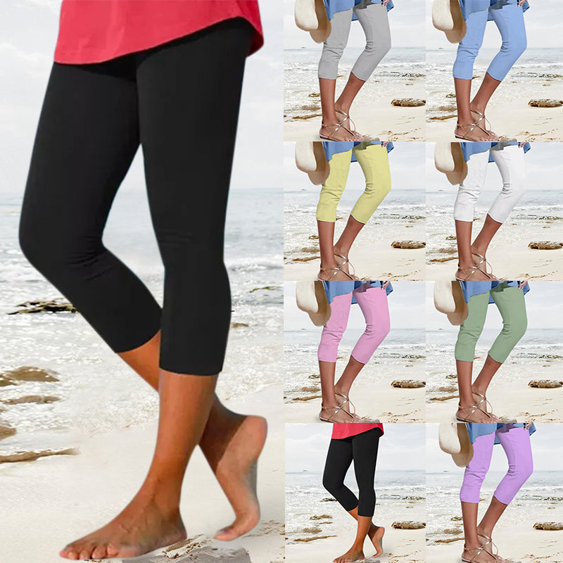 "Damhögmidja 3/4 yoga leggings med fickor, knälång, svart, smörmjuk yta, hög midja, främre fickor, stretchigt tyg."