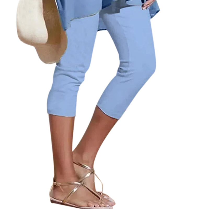 "Damhögmidja 3/4 yoga leggings med fickor, knälång, svart, smörmjuk yta, hög midja, främre fickor, stretchigt tyg."