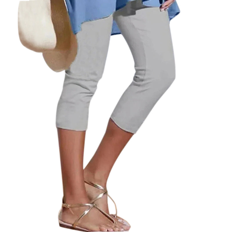 "Damhögmidja 3/4 yoga leggings med fickor, knälång, svart, smörmjuk yta, hög midja, främre fickor, stretchigt tyg."
