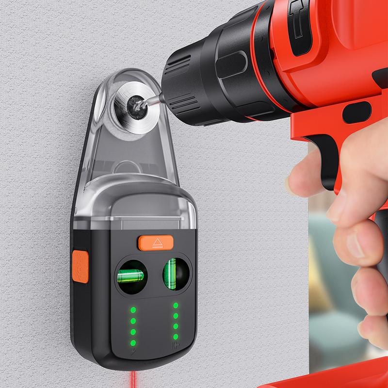 "Dammfångare med inbyggd lasernivå, svart och grå design, för exakt och dammfri borrning i byggprojekt."