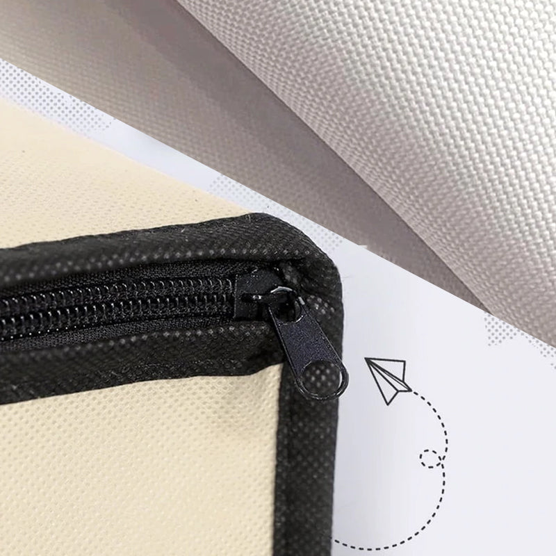 "Dammtät förvaringsväska med förstärkt handtag och stor kapacitet. Beige non-woven-material, rundade hörn, dragkedja."