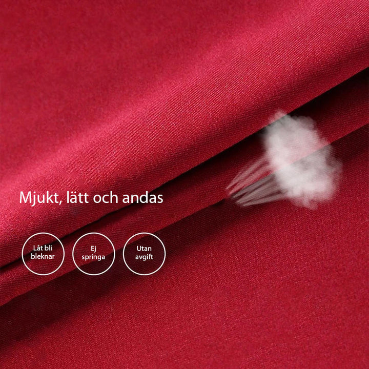 "Dams 2-i-1 stretch shorts och kjol, svart, elastisk och bekväm design, perfekt för sommardagar och aktiviteter."