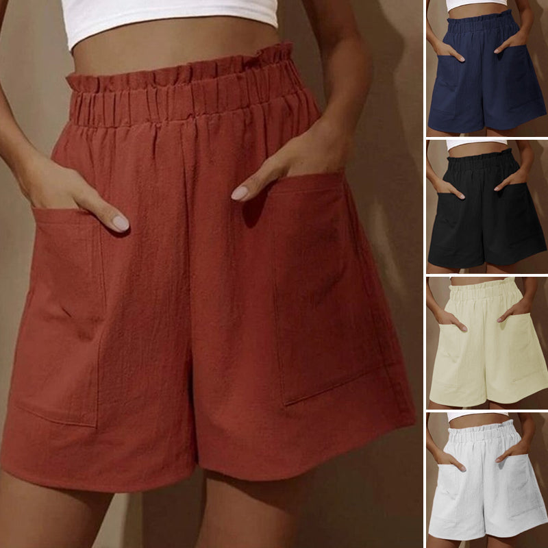 Damshorts med hög midja i bomull, framifrån. Perfekta för sommaren, med justerbar dragsko och två snedställda fickor.