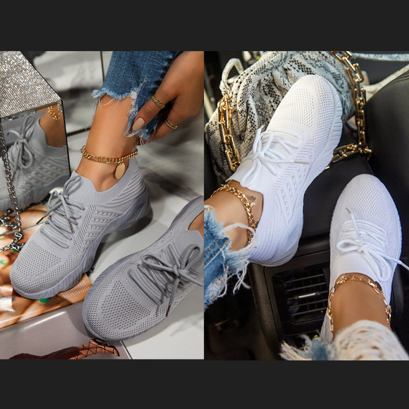 "Damskor casual sneakers, andningsbara och bekväma, i vit design med ergonomiskt stöd och halkfri sula."
