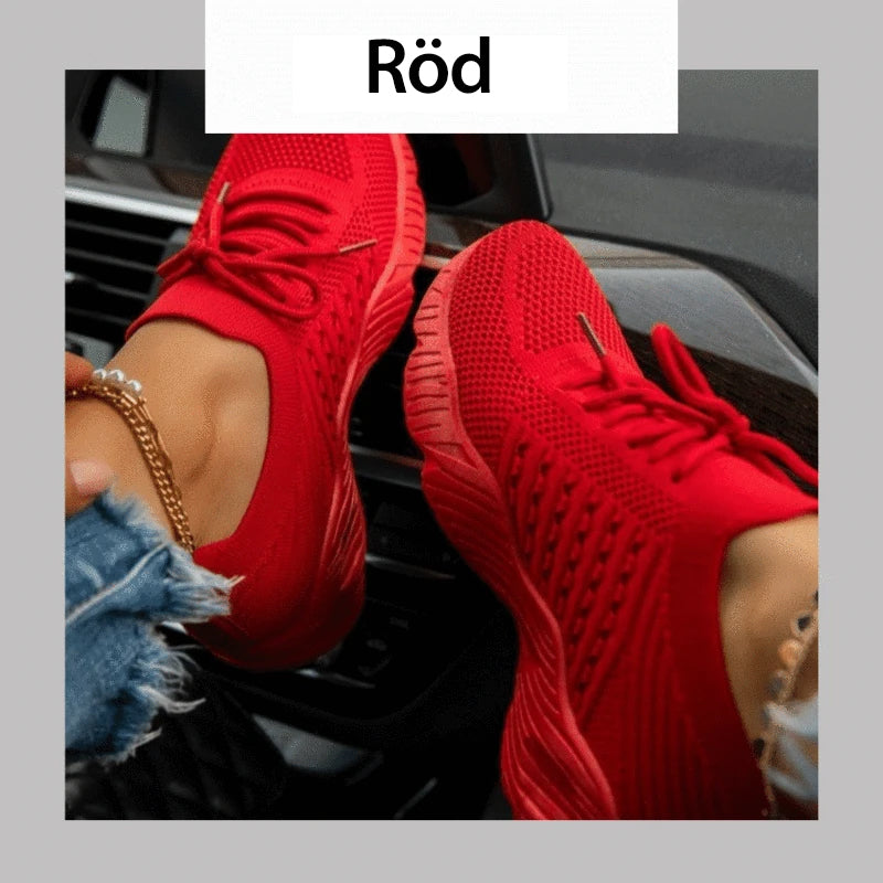 "Damskor casual sneakers, andningsbara och bekväma, i vit design med ergonomiskt stöd och halkfri sula."