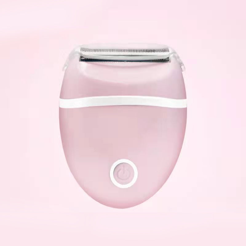 "Damskötsel rakapparat i blått och rosa för våt och torr rakning, kompakt och bärbar, för smidig hårborttagning."