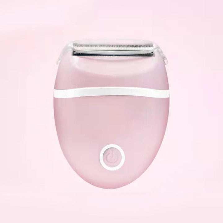 "Damskötsel rakapparat i blått och rosa för våt och torr rakning, kompakt och bärbar, för smidig hårborttagning."