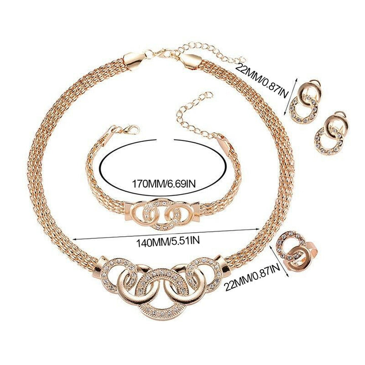 "Damsmyckesset i guld och silver med zirconia, innehåller halsband, armband, örhängen och ring, elegant design."