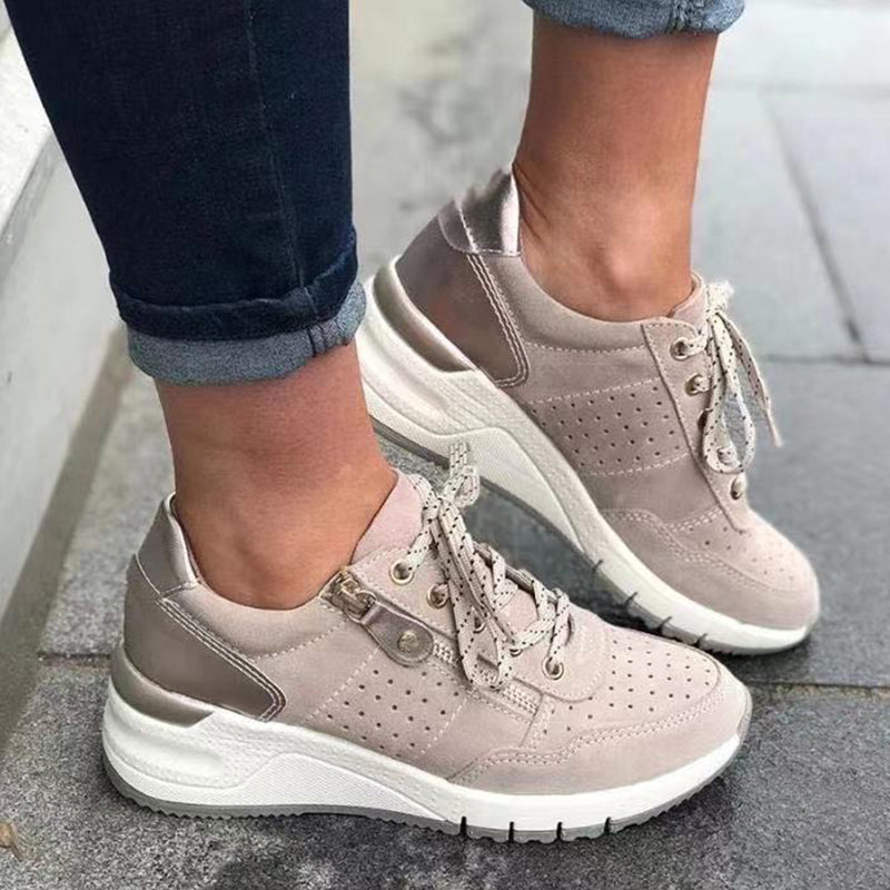 "Damsneakers med elastisk sula, andningsbar grön ovandel, stilren och bekväm design för moderna kvinnor."
