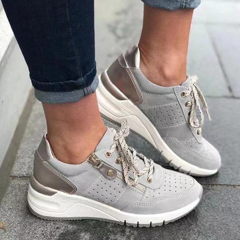 "Damsneakers med elastisk sula, andningsbar grön ovandel, stilren och bekväm design för moderna kvinnor."