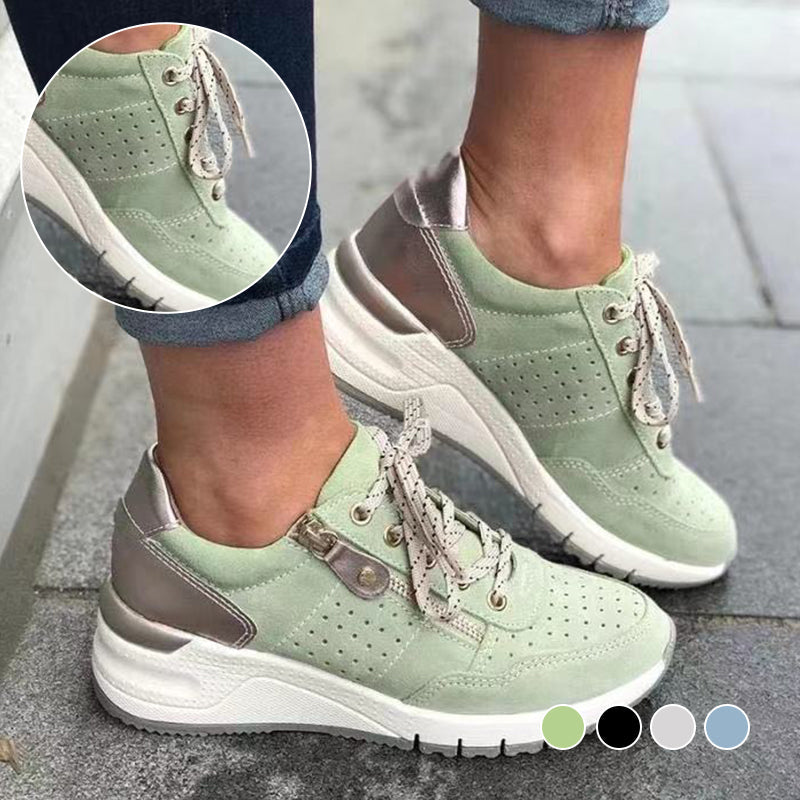 "Damsneakers med elastisk sula, andningsbar grön ovandel, stilren och bekväm design för moderna kvinnor."